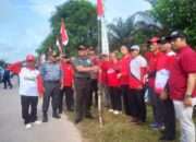 Danramil 0906-09/Kota Bangun Pimpin Gerakan Pemasangan Bendera Merah Putih Sambut HUT RI ke-79